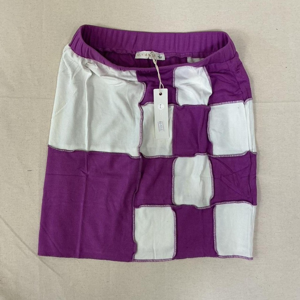 Trendy two-piece‎ set featuring a ribbed patchwork colorblock design